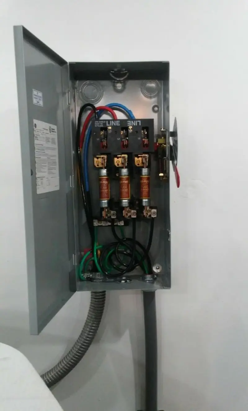 Three-phase disconnect switch installed for Smoke Detector Installation in Camp Springs